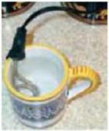 Chapter 25, Problem 9Q, If the resistance of a small immersion heater (to heat water for tea or soup. Fig. 2533) was 