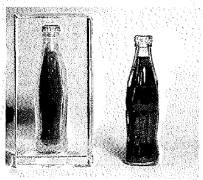 Chapter 29, Problem 41A, The photo below shows two identical cola bottles, each with the same amount of cola. The right 