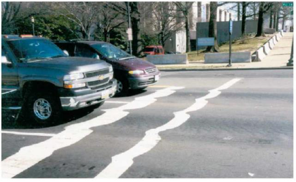 Chapter 12, Problem 2AC, Observe the warped lines on asphalt pavement in front of a stoplight (Fig. 12.32 ). (a) What type of , example  2